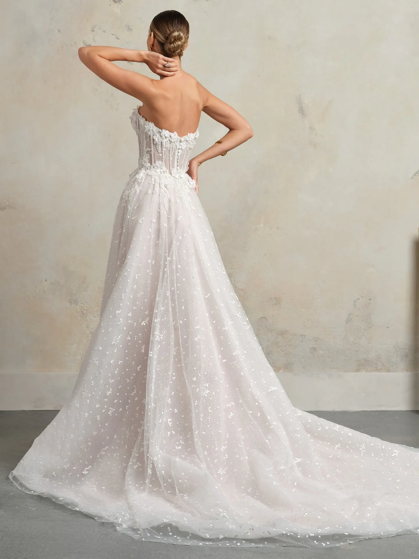 Rebecca Ingram bridal dress back view with dotted glitter tulle.