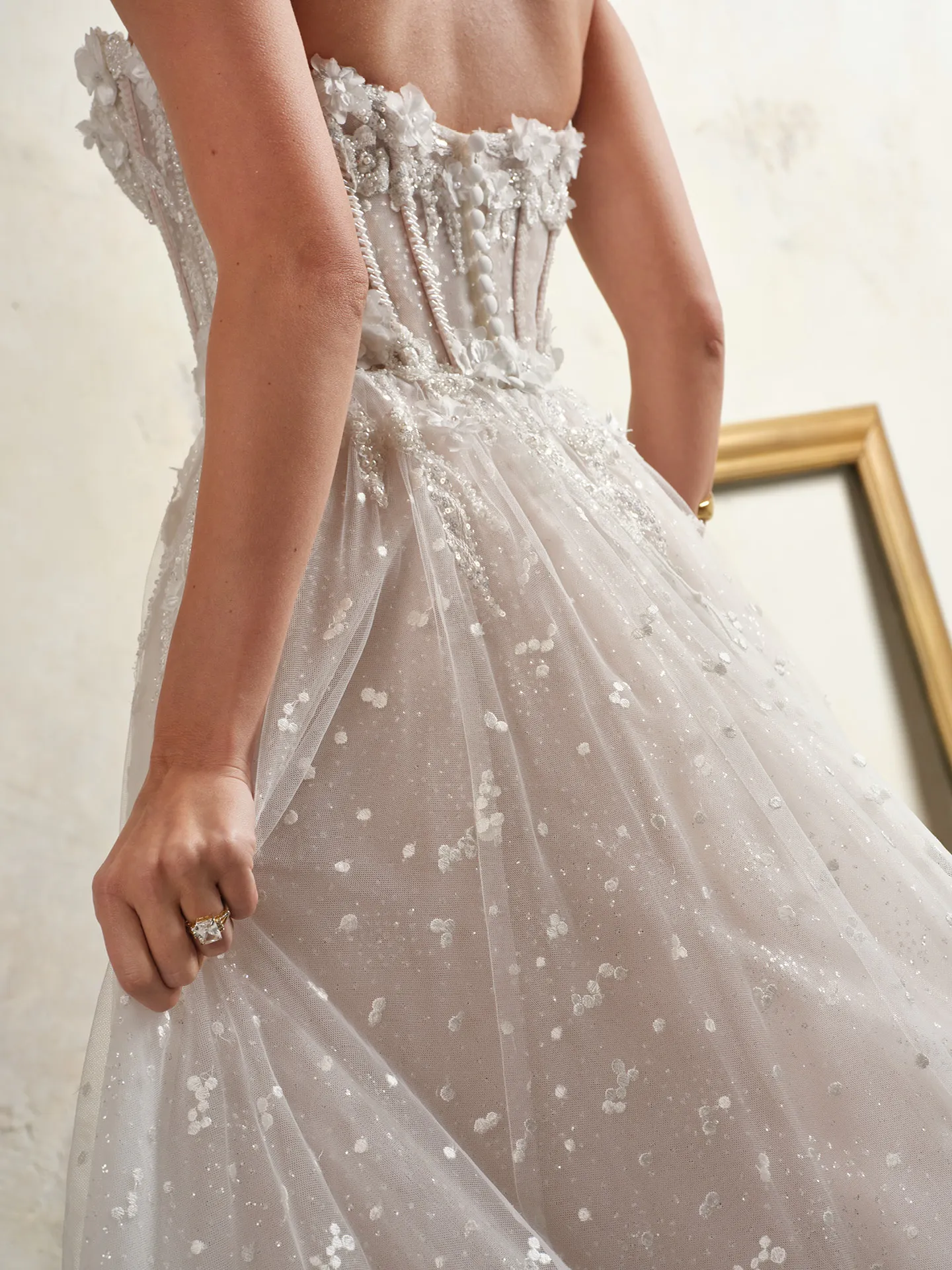 Rebecca Ingram strapless floral glitter tulle bridal dress back view