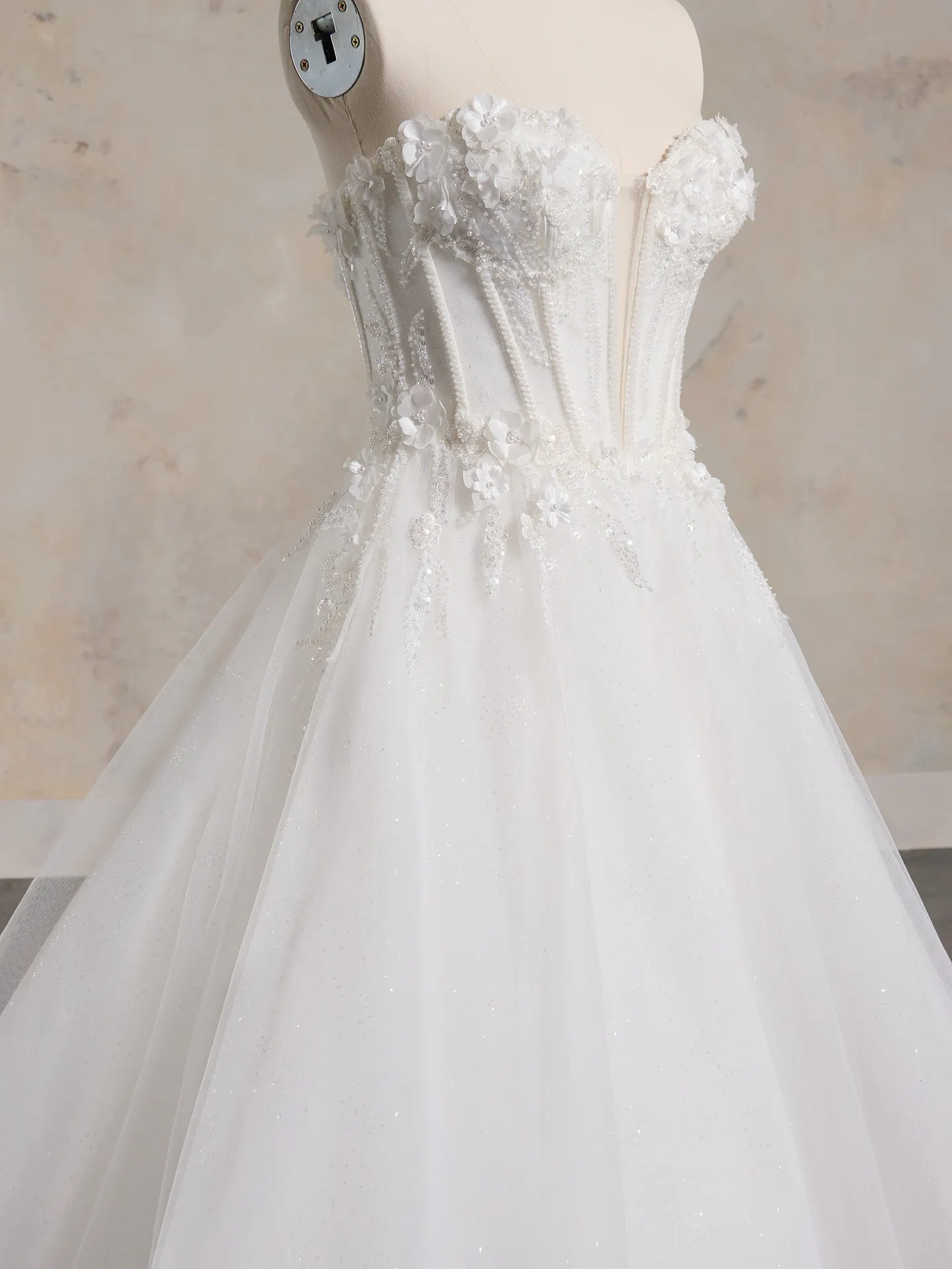 Maggie Sottero ballgown side view dotted glitter tulle floral bridal dress
