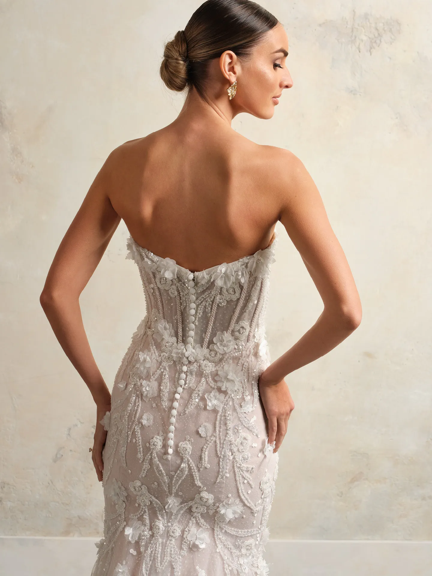 Rebecca Ingram bridal gown back view with 3-D floral accents