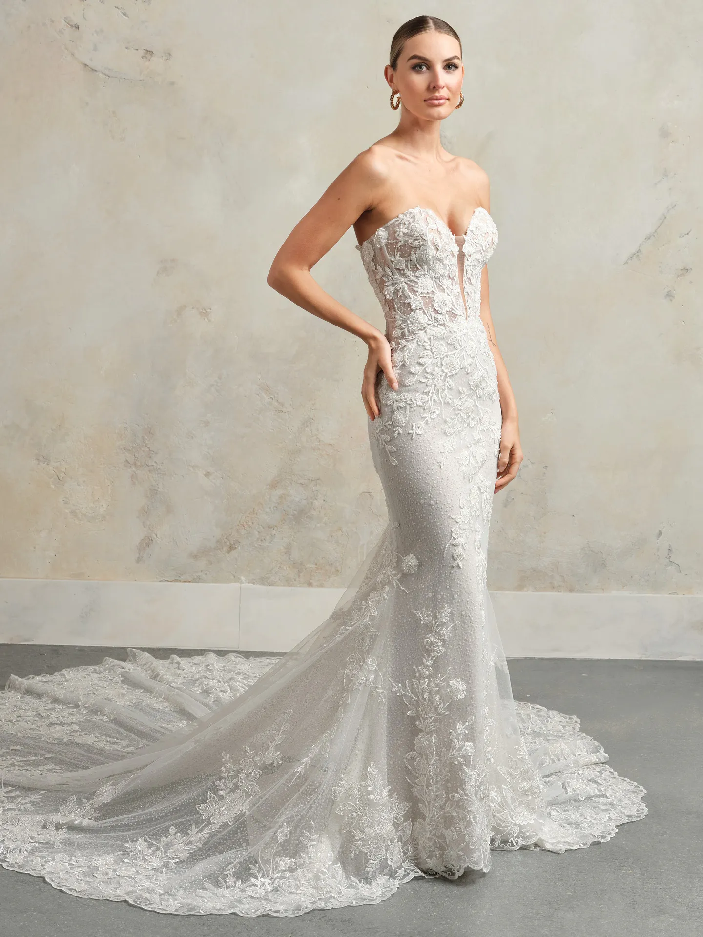 Chesney wedding dress, illusion sweetheart neckline, side view, lace and floral pattern