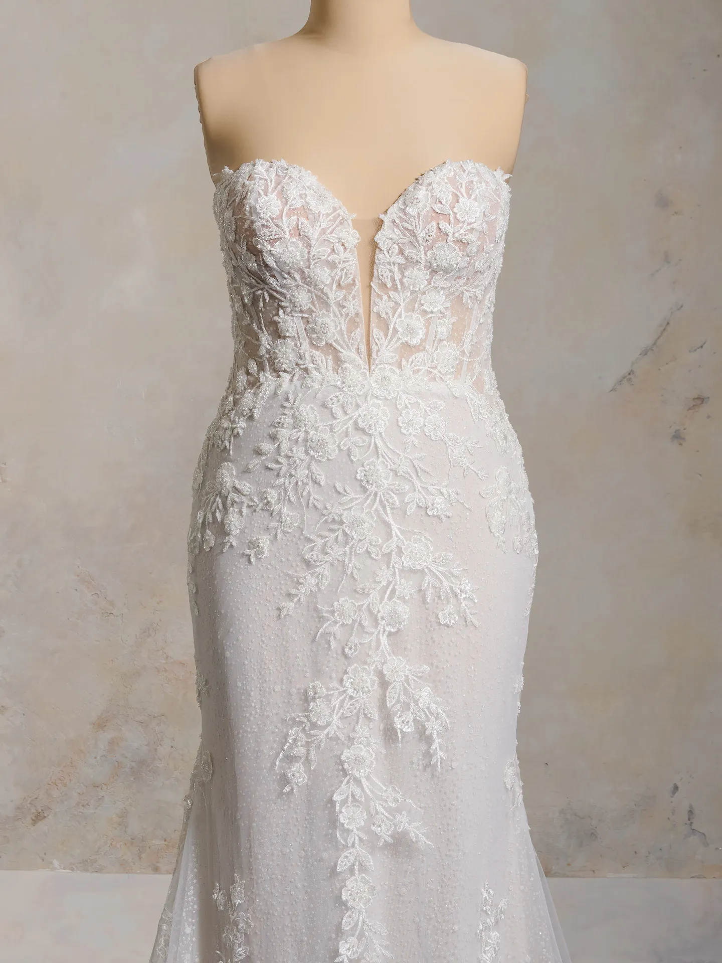 Maggie Sottero Chesney front view, illusion sweetheart neckline, floral lace detail.