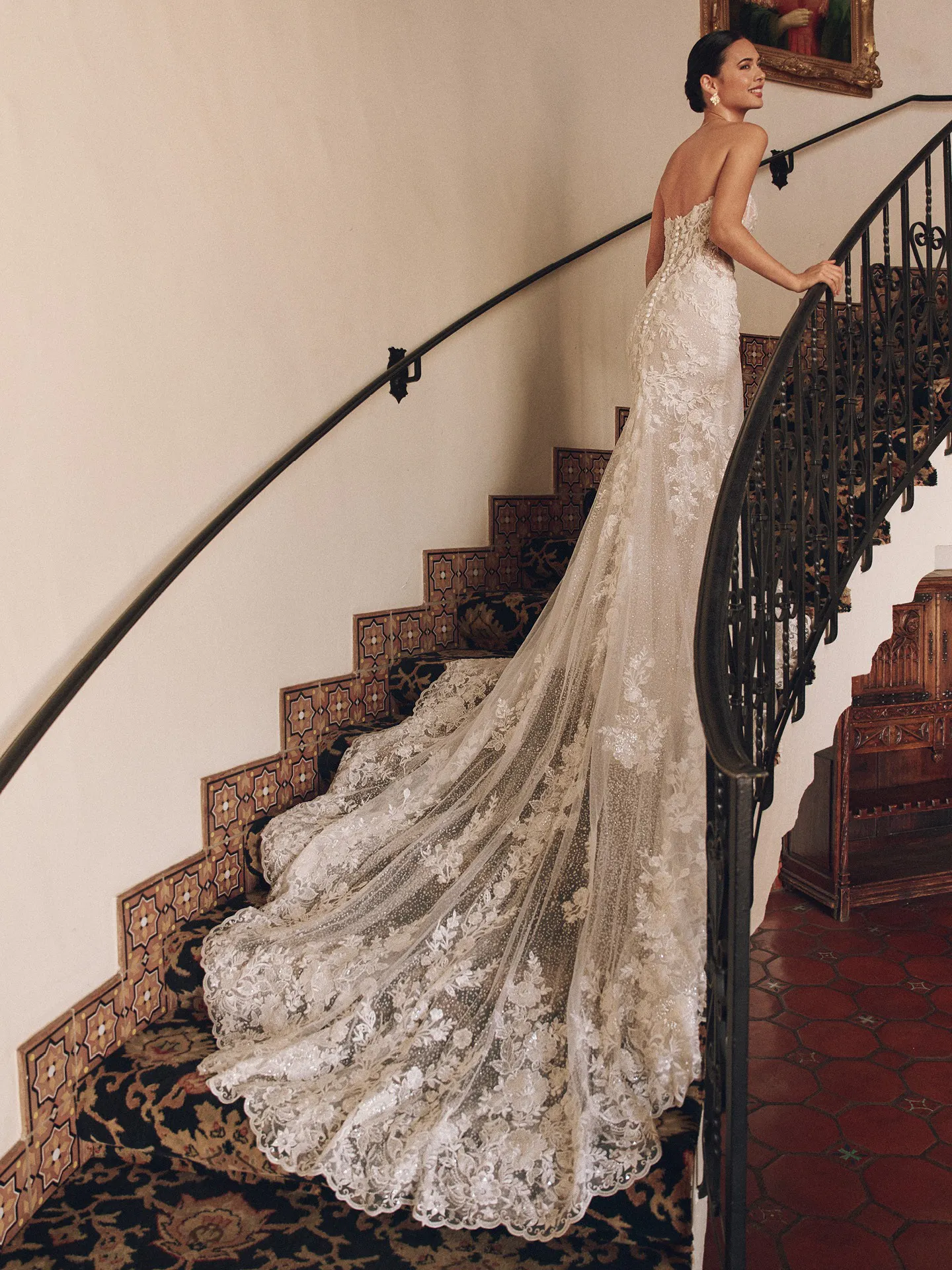 Rebecca Ingram Chesney back view, lace train, illusion sweetheart neckline, staircase setting.
