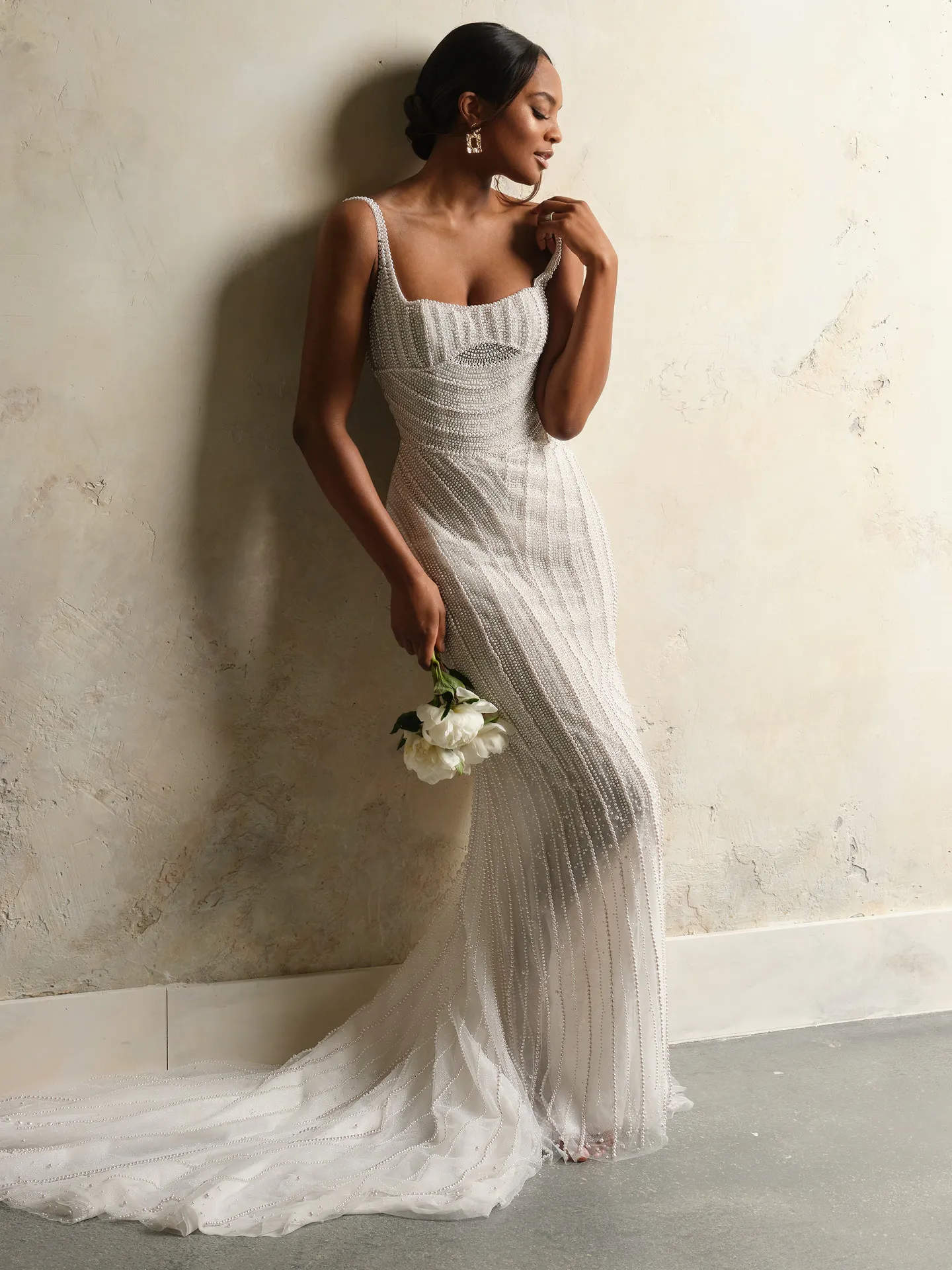 Maggie Sottero Danica front view with pearls and basque waist
