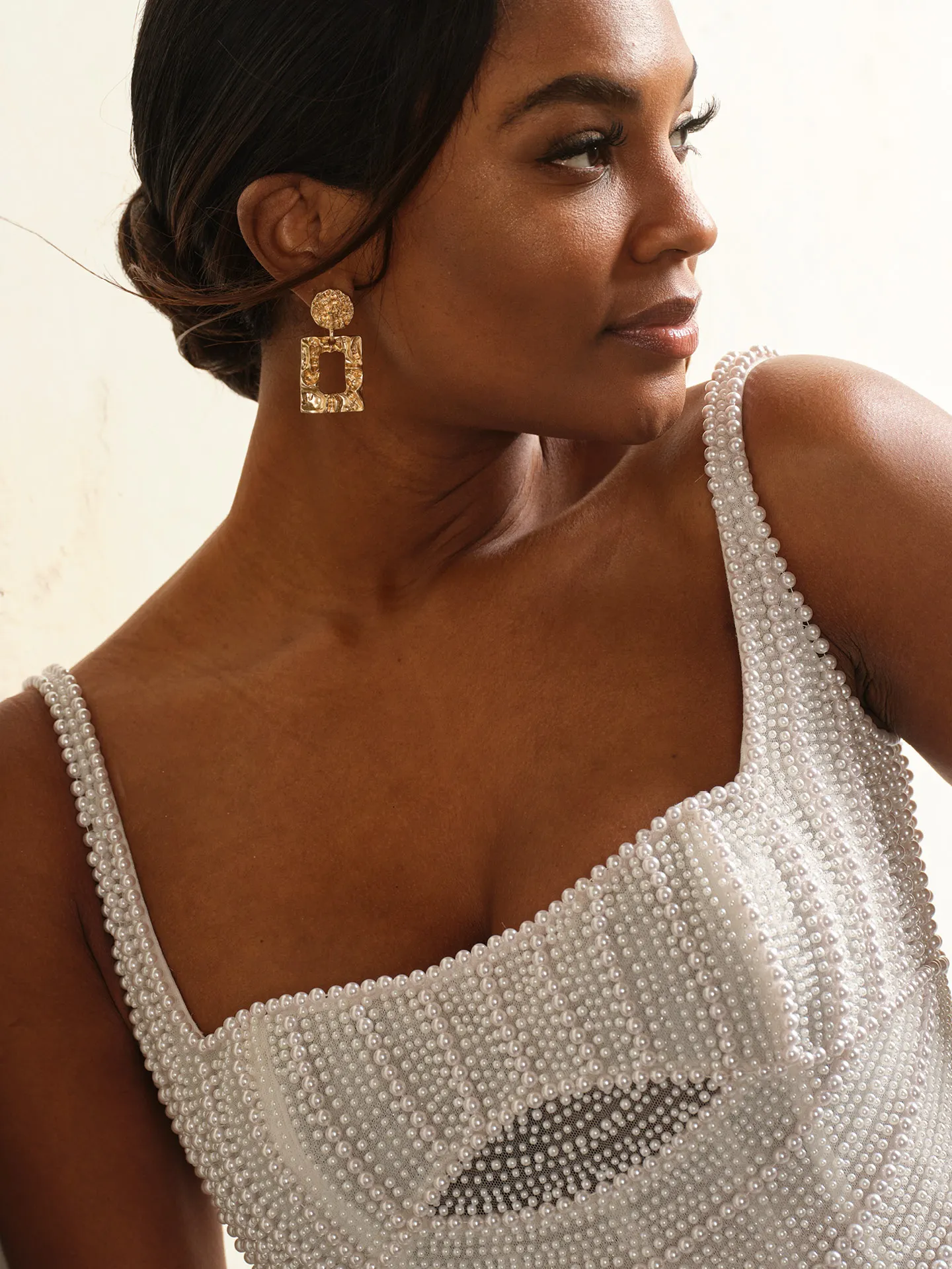 Maggie Sottero Danica close-up of pearl details on straps and bodice.