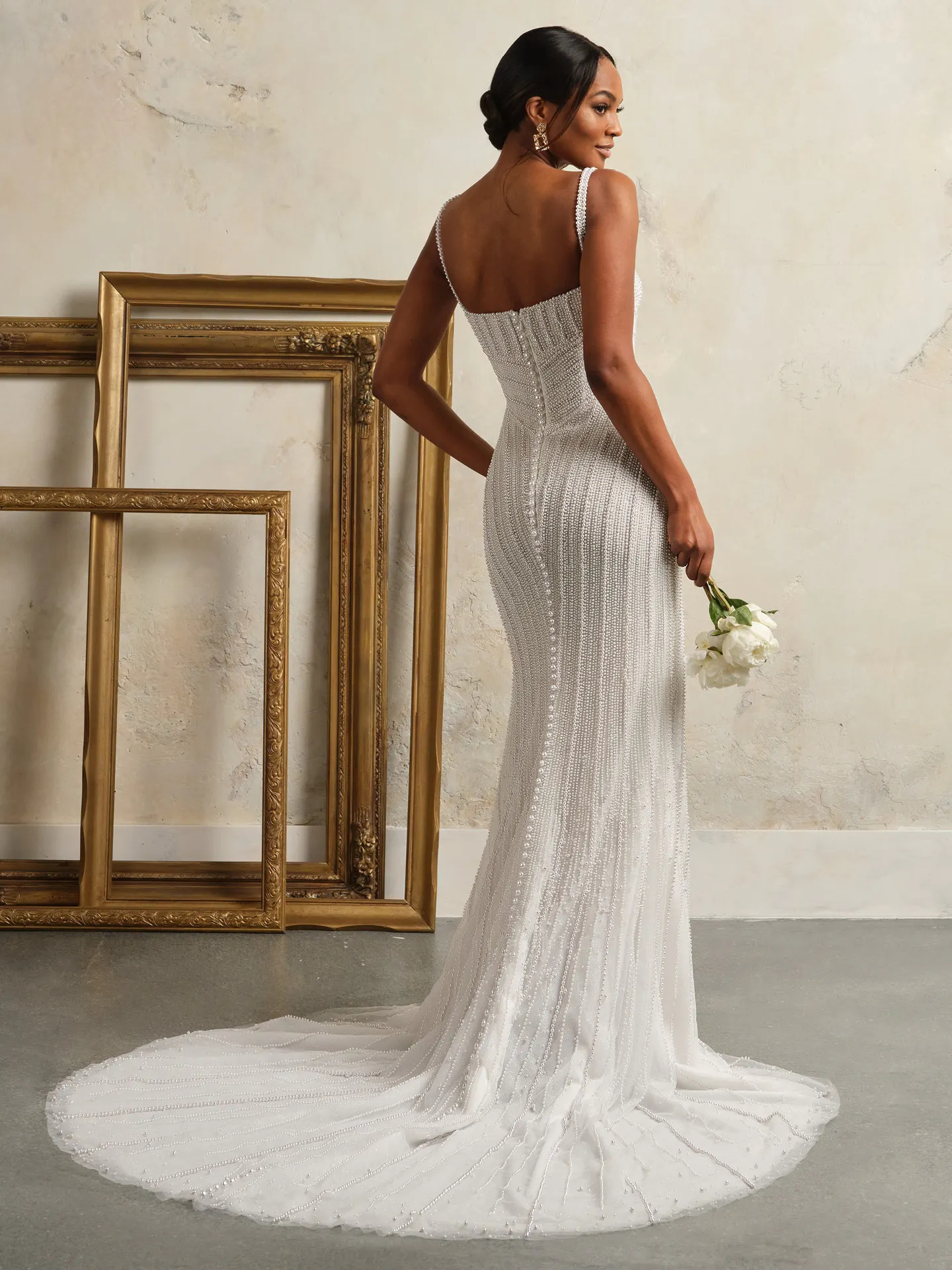 Maggie Sottero Danica back view with pearl detail and train