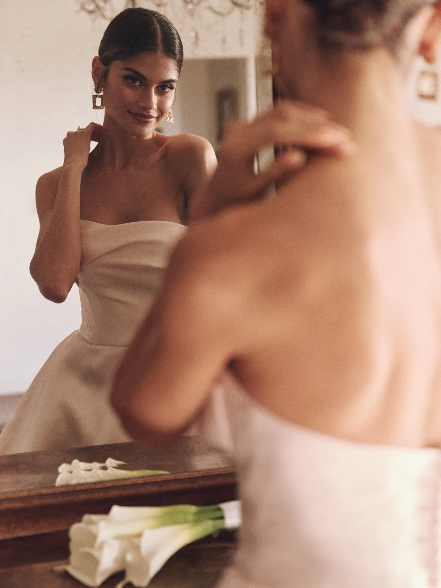 Maggie Sottero strapless asymmetrical Mikado bridal gown side view