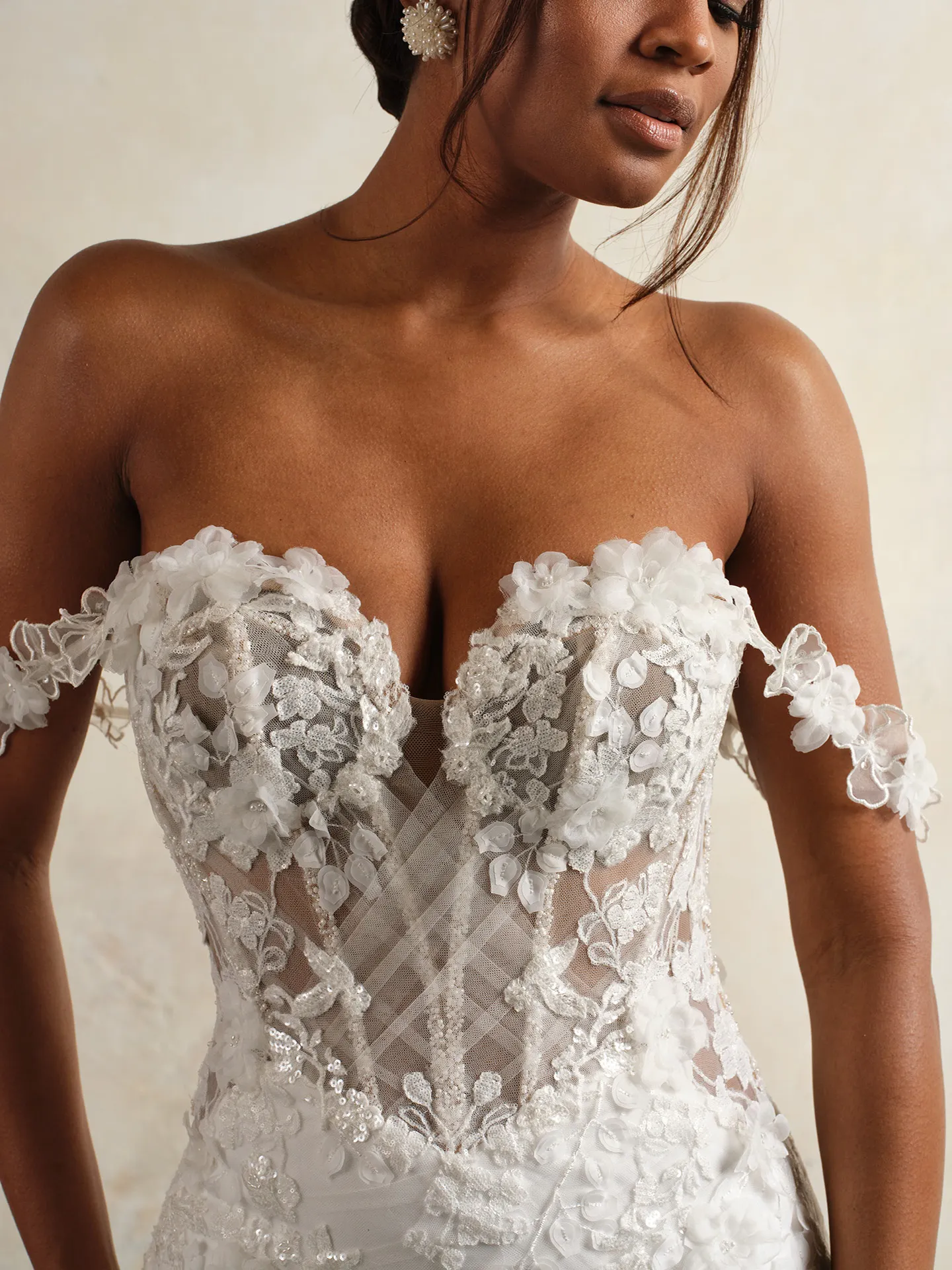 Maggie Sottero Kellen front view floral lace tulle wedding gown with crisscross detail