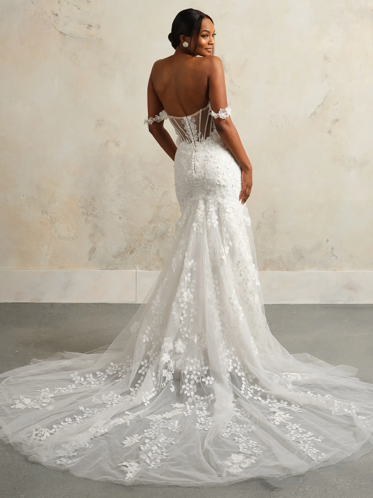 Sottero Kellen wedding gown back view with floral crisscross tulle design.