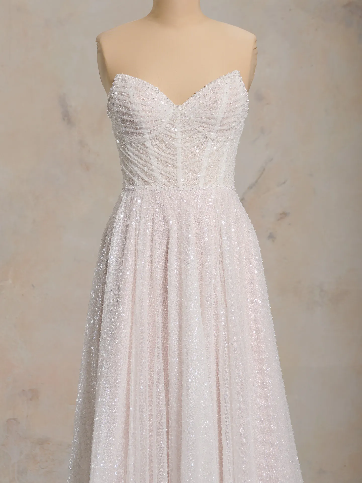 Sottero and Midgley Monica gown front view with sequined bodice and tulle skirt