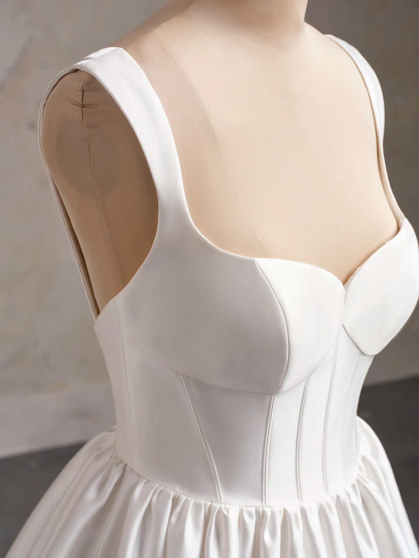Maggie Sottero wedding dress front view with corset and ruffled details.