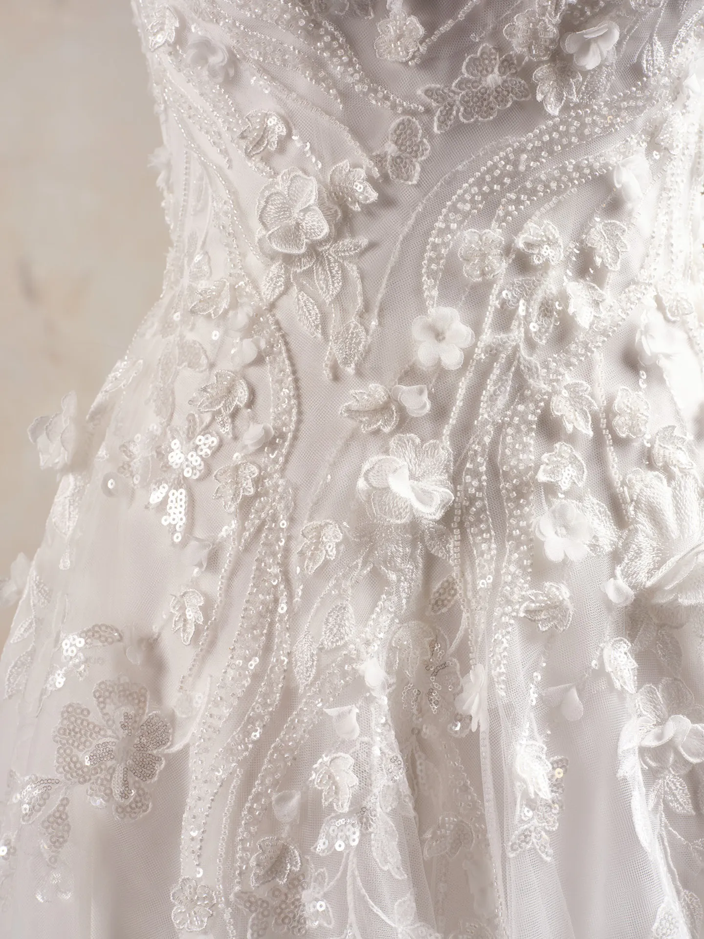 3-D floral lace detail on bridal dress.
