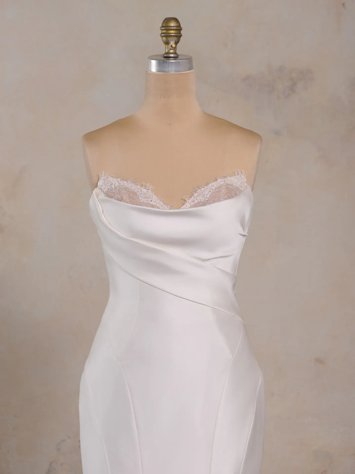 Leilani fit-and-flare dress front view with lace trim on mannequin.