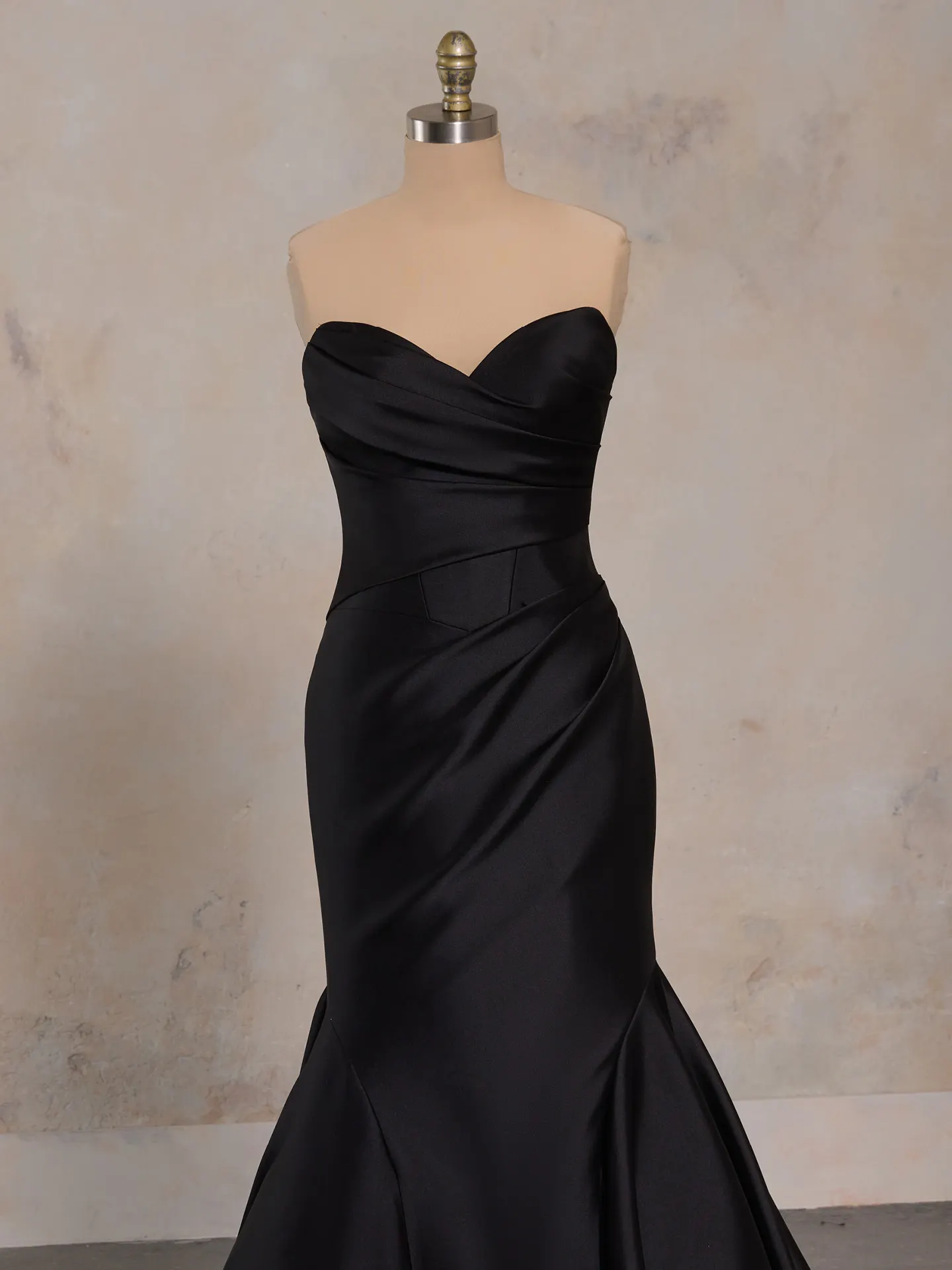 Maggie Sottero Giselle satin strapless dress on mannequin, front view.