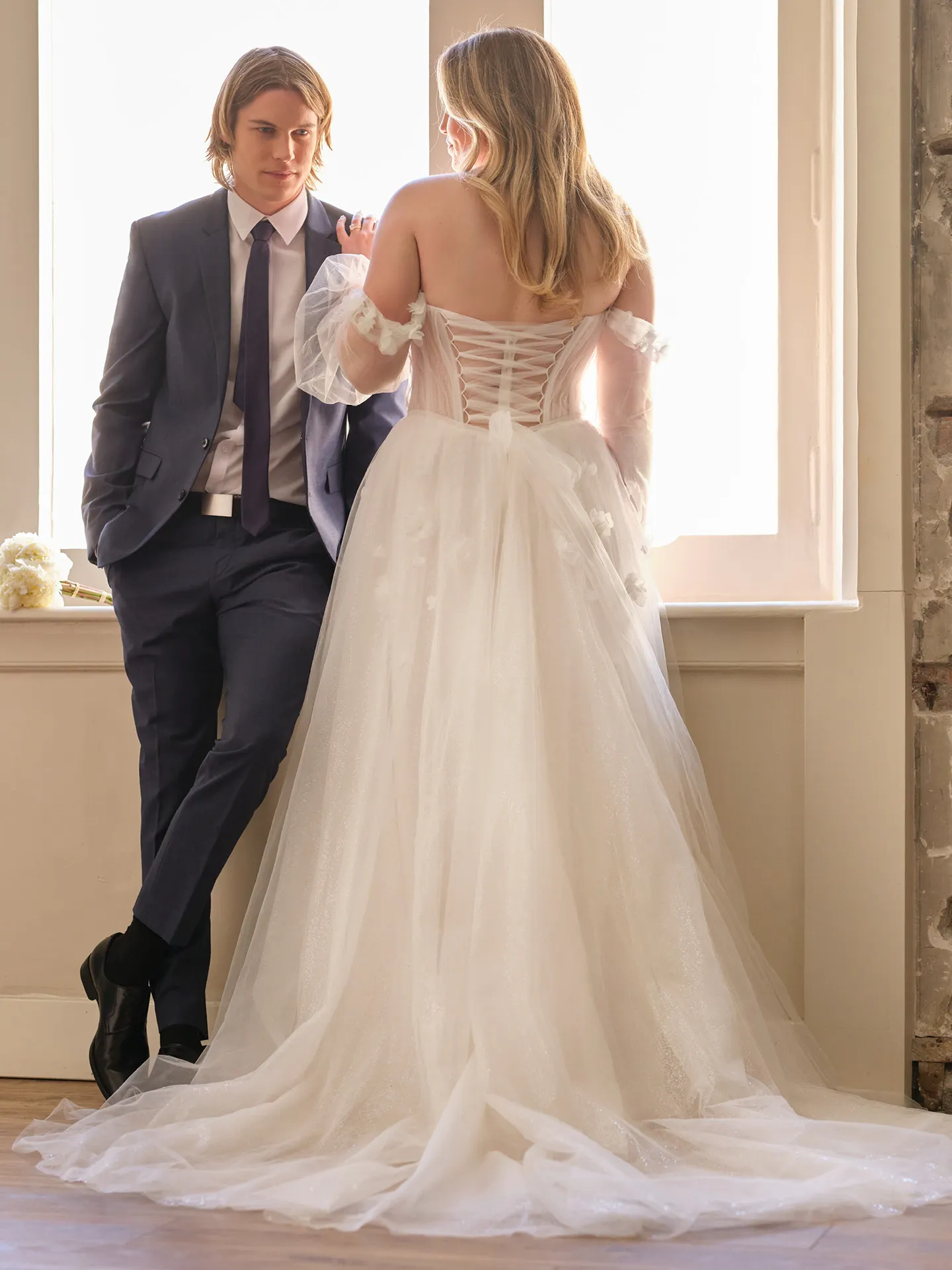 Maggie Sottero Allison back view tulle A-line gown with off-shoulder sleeves