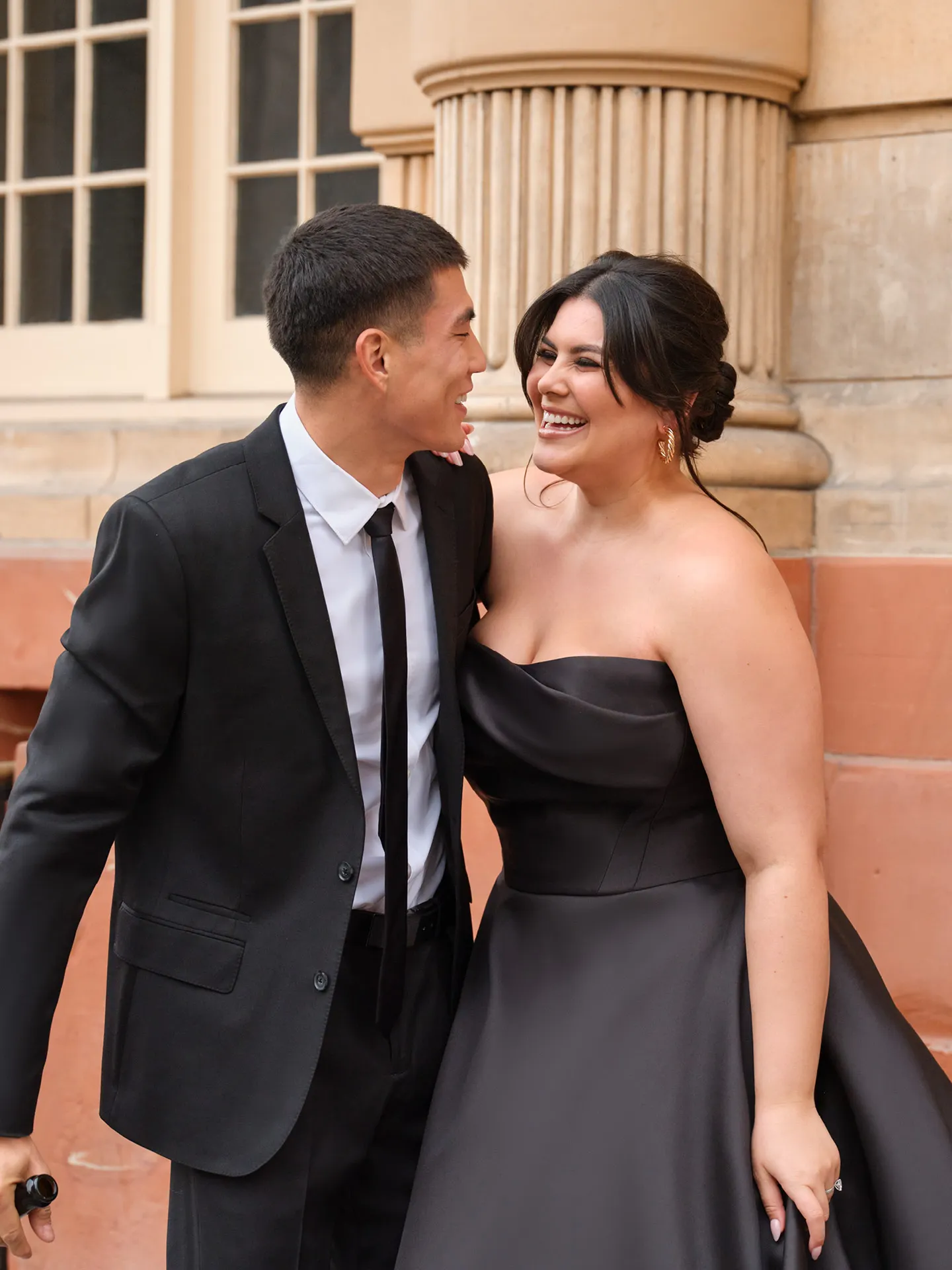 Faro black strapless Mikado wedding gown worn by a bride.