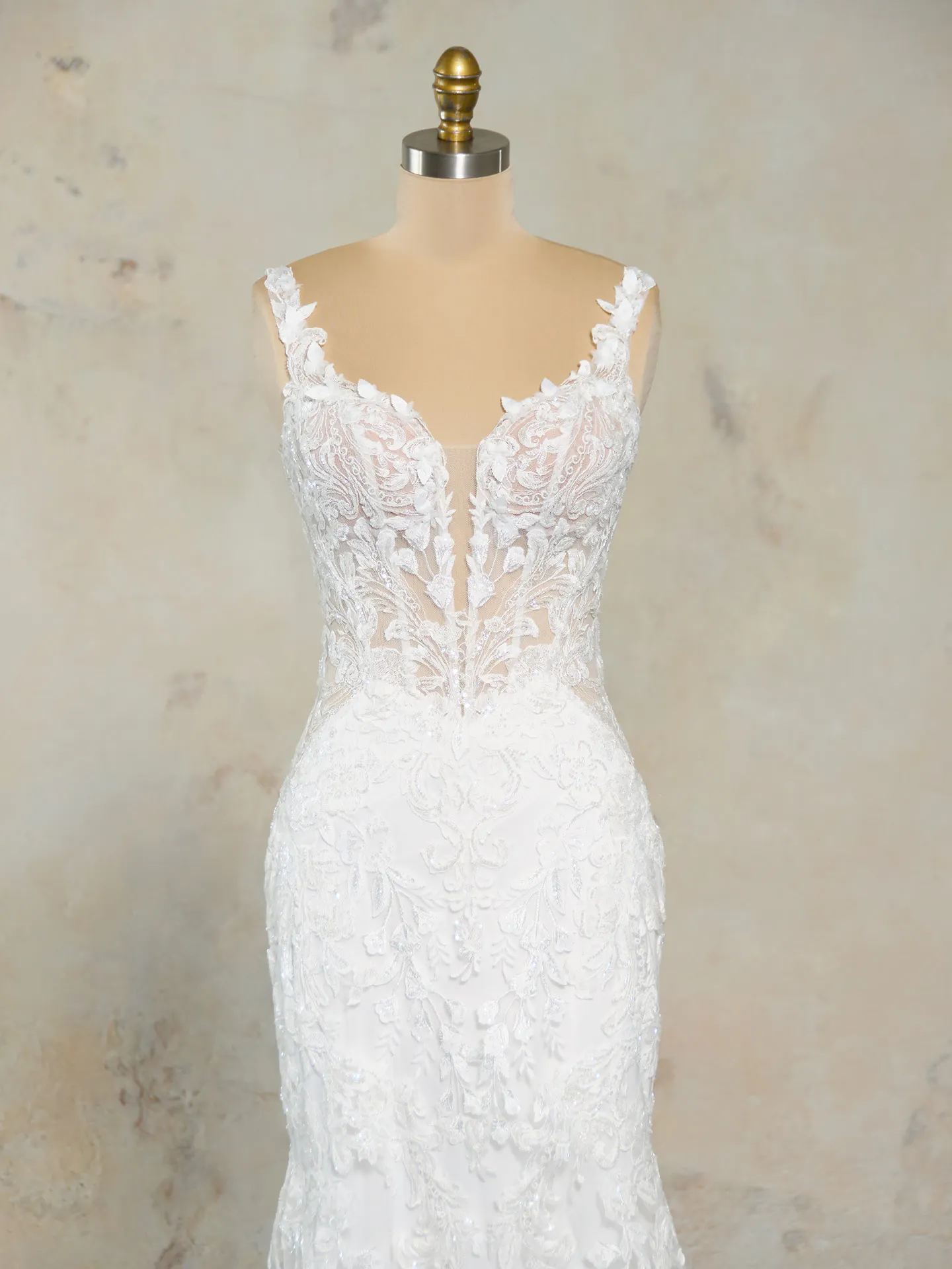 Maggie Sottero Zeta front view lace tulle mermaid wedding gown on mannequin