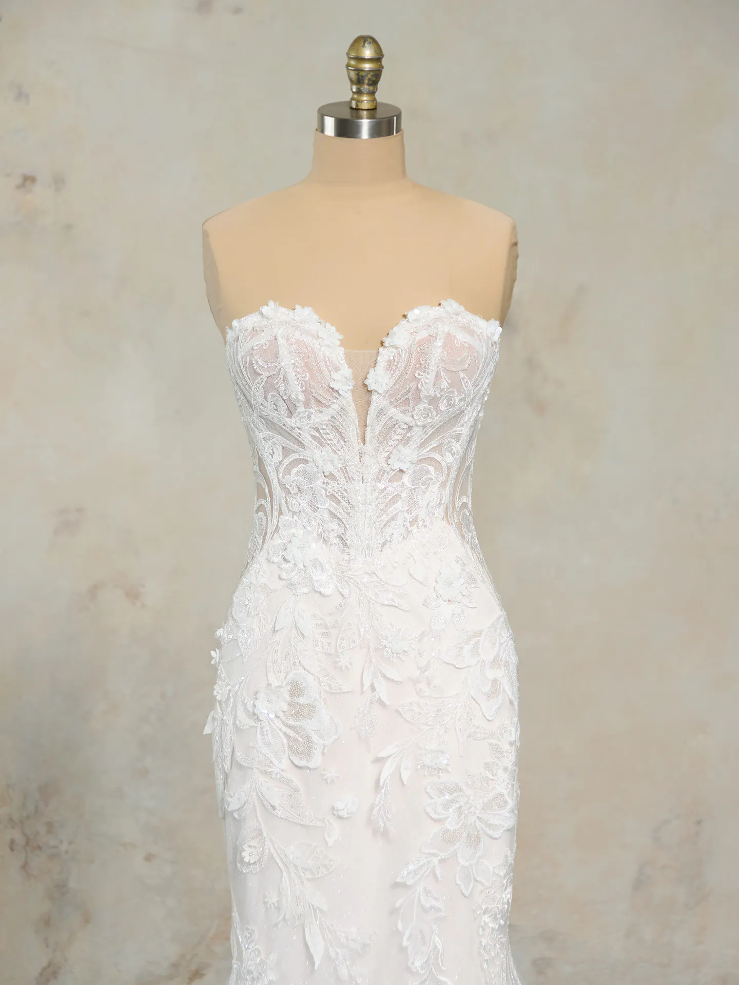 Chic Nyjah wedding dress front view with scalloped lace and sparkling floral detail.