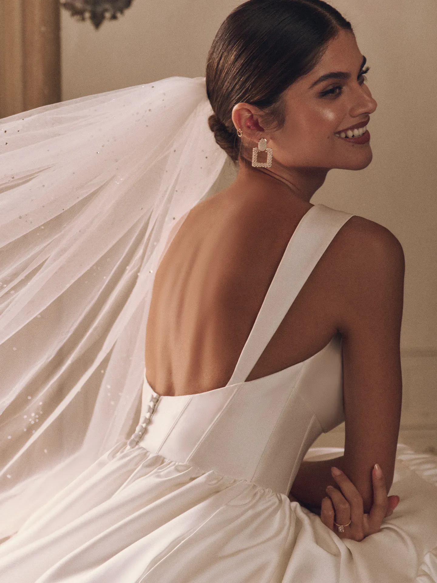 Maggie Sottero Talitha back view dress with corset and ruffled bow