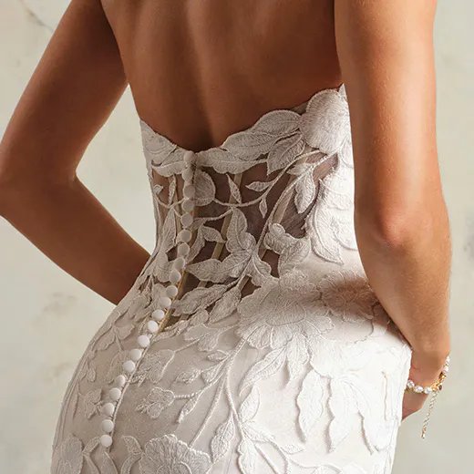 Maggie Sottero Bridget back view, floral lace detail on wedding dress with buttons down the back.