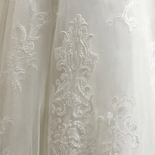 Maggie Sottero Kyler glittering lace detail on A-Line wedding dress.