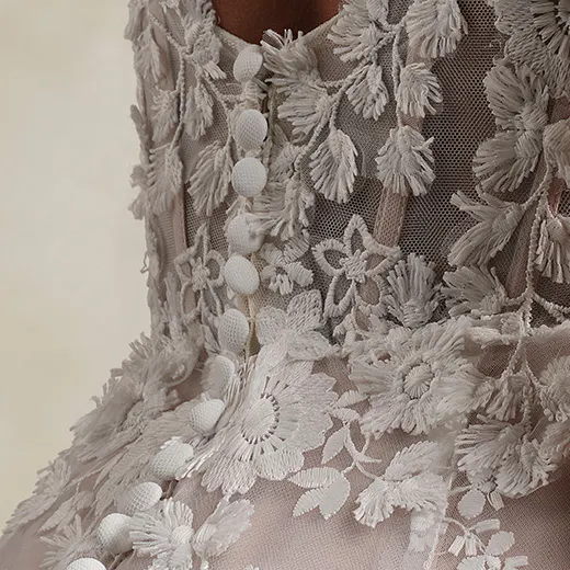 Ladonna Lane 3-D floral lace detail on back of Maggie Sottero mermaid bridal gown.