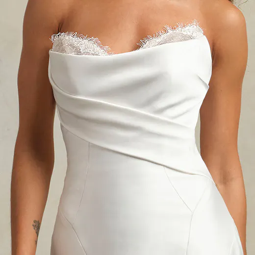 Leilani fit-and-flare dress front view with lace-trimmed neckline.