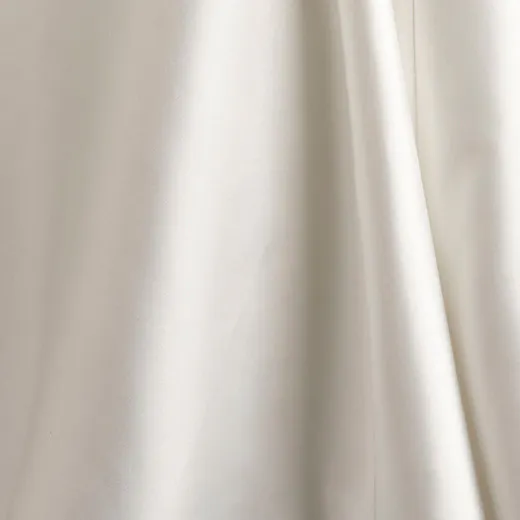 Leilani Marie wedding gown fabric draped close-up.
