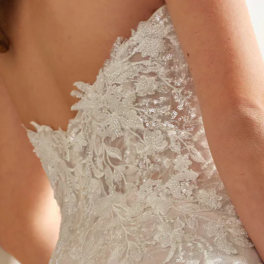 Yolanda lace mermaid dress back view featuring intricate floral detailing.