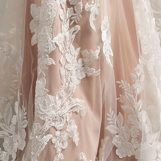 Lace tulle detail of Maggie Sottero Zeta mermaid wedding gown.