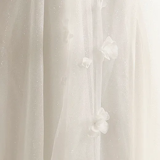 Maggie Sottero Allison tulle A-line gown with floral details.