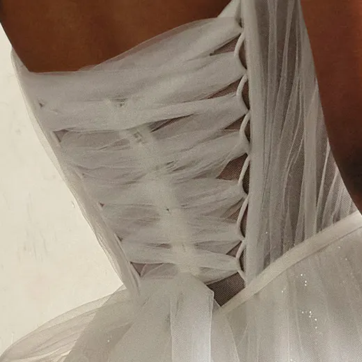 Maggie Sottero Allison back view, lace-up tulle A-line wedding gown.
