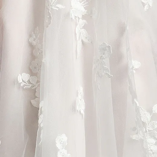 Benicia Leigh gown with sparkly floral lace detail.