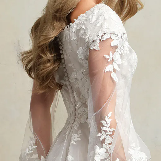 Rebecca Ingram Benicia side view lace sleeves and floral appliqué