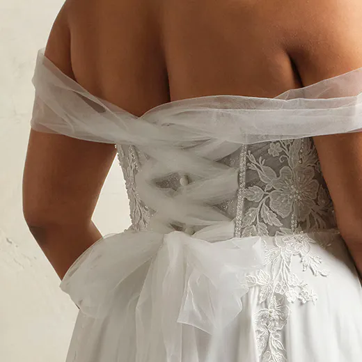 Blake wedding dress back view, lace corset detail, off-shoulder tulle straps.