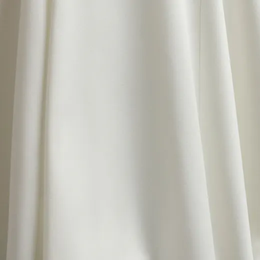 Maggie Sottero Kelsey close-up of white sheer crepe fabric.