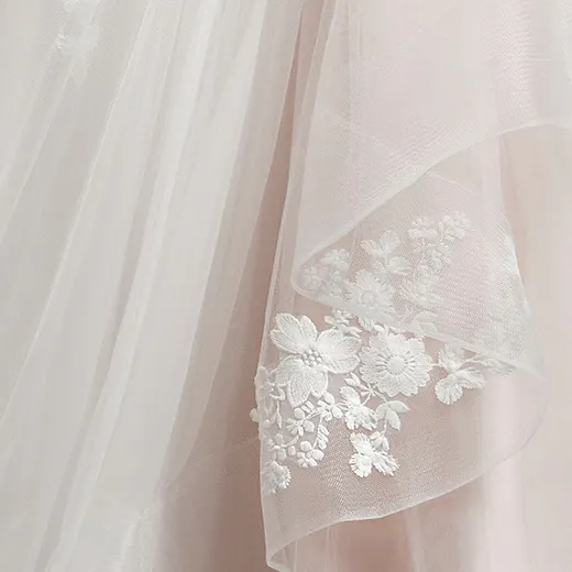 Winona Leigh floral embroidered ball gown detail.