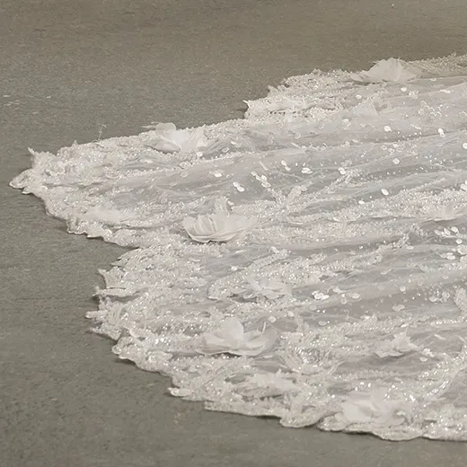 Maggie Sottero sparkling Athlone Lane dress detail with 3D floral fit-and-flare embellishments.