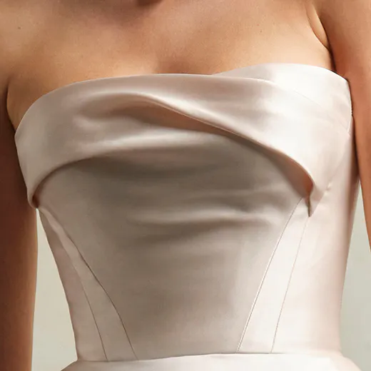 Strapless asymmetrical draped Mikado gown front view.