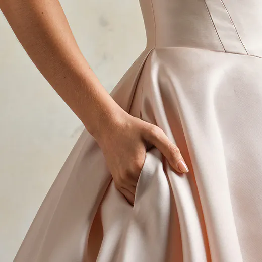 Maggie Sottero strapless draped Mikado gown side view
