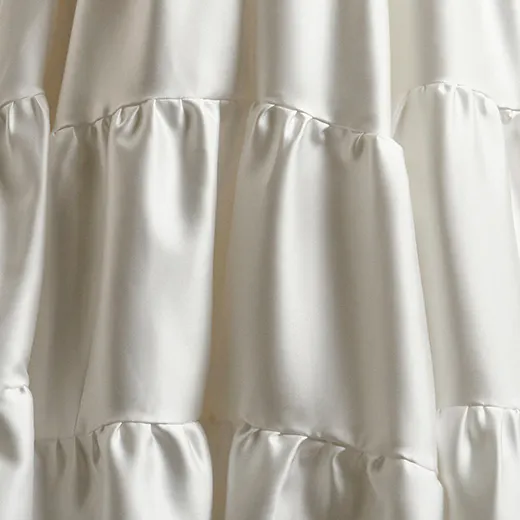 Maggie Sottero Talitha ruffled satin texture wedding dress detail.