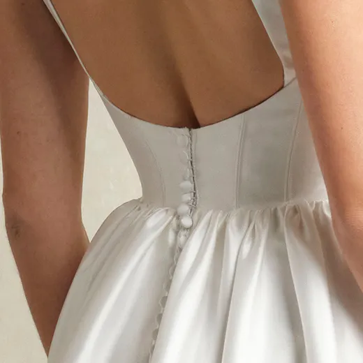 Maggie Sottero Talitha back view, corset buttons, ruffled skirt detail