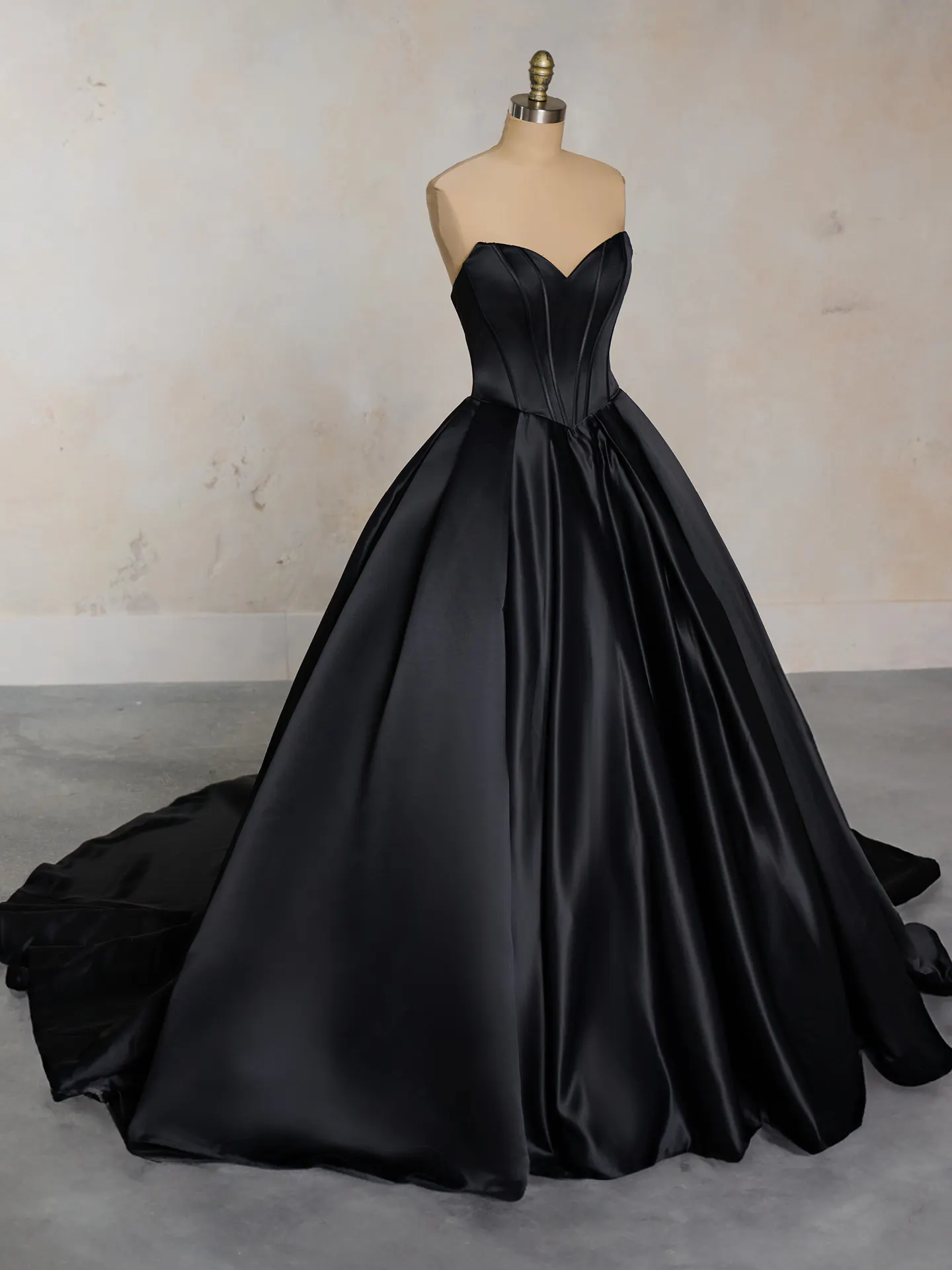 Maggie Sottero Derrick satin ballgown front view on mannequin