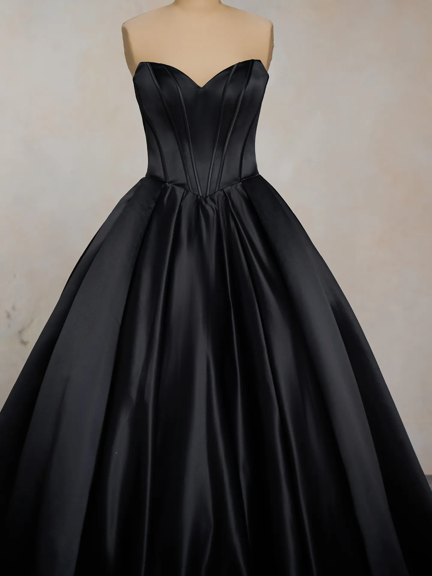 Maggie Sottero Derrick black satin ballgown front view