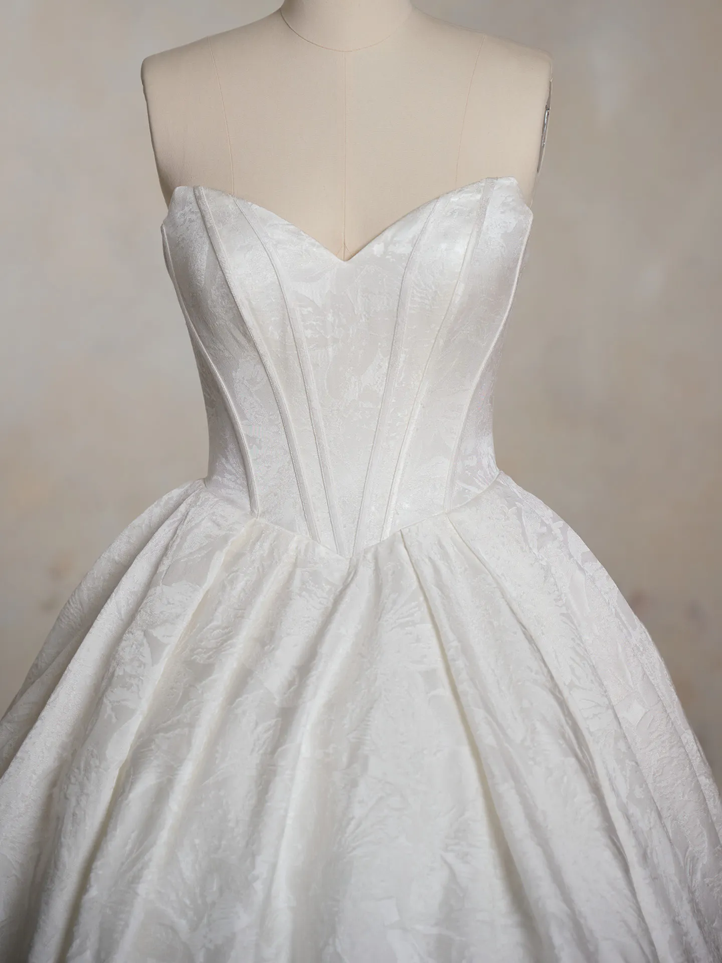 Maggie Sottero ballgown front view with floral pattern and sweetheart neckline.