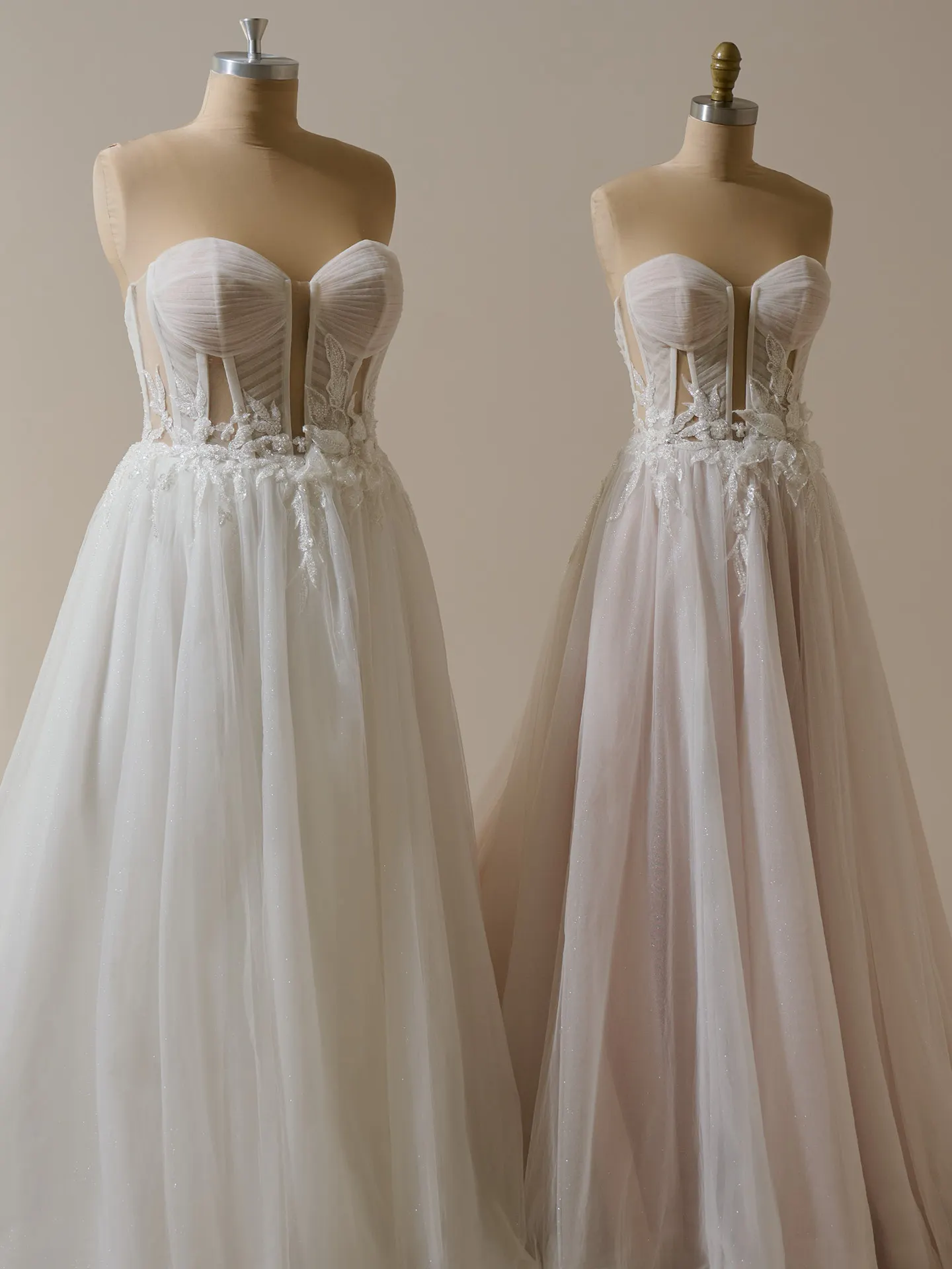Maggie Sottero Arden Illusion Pleated A-line front view on mannequins