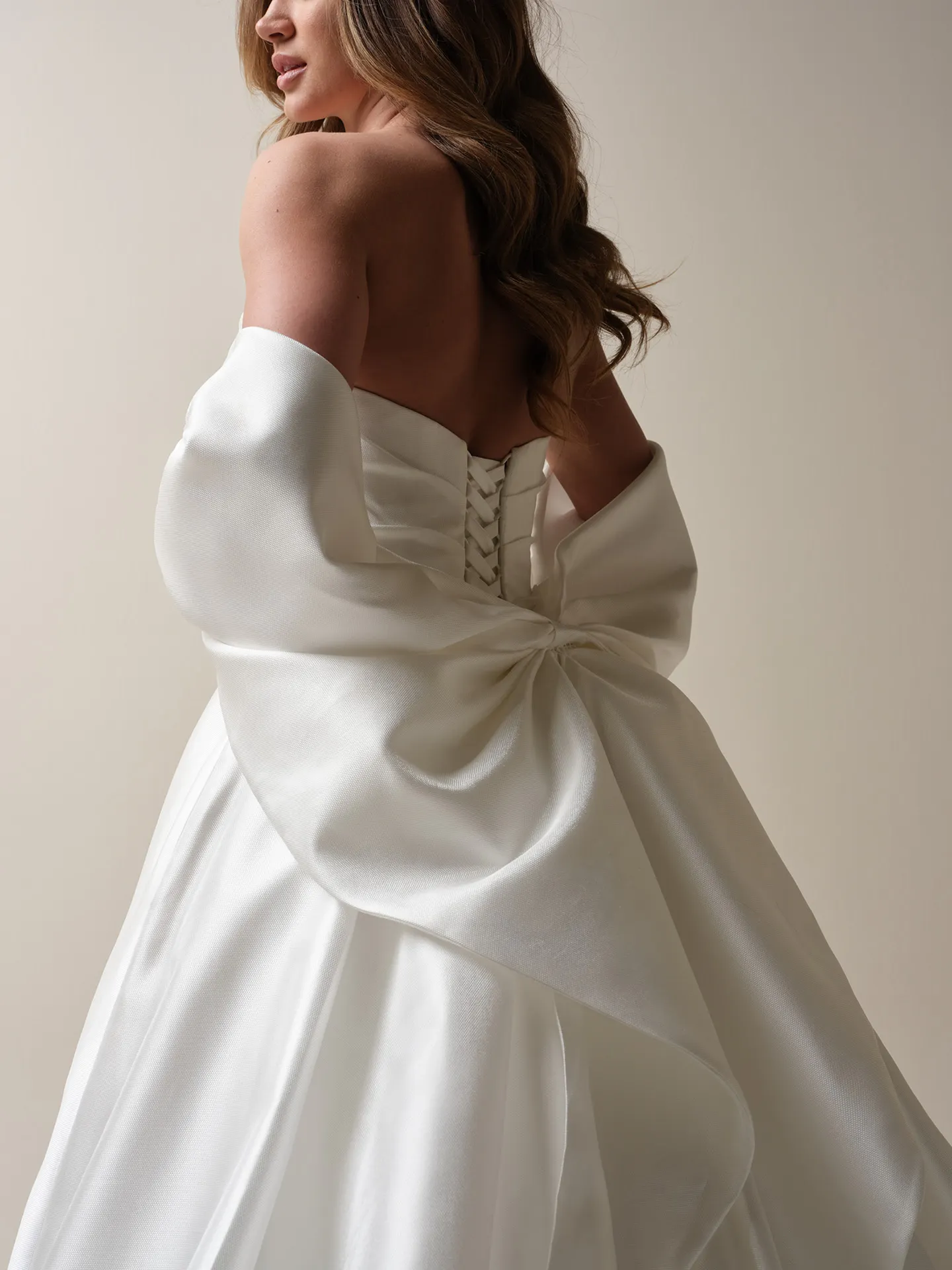 Maggie Sottero Aubrielle back view with detachable satin wedding bow