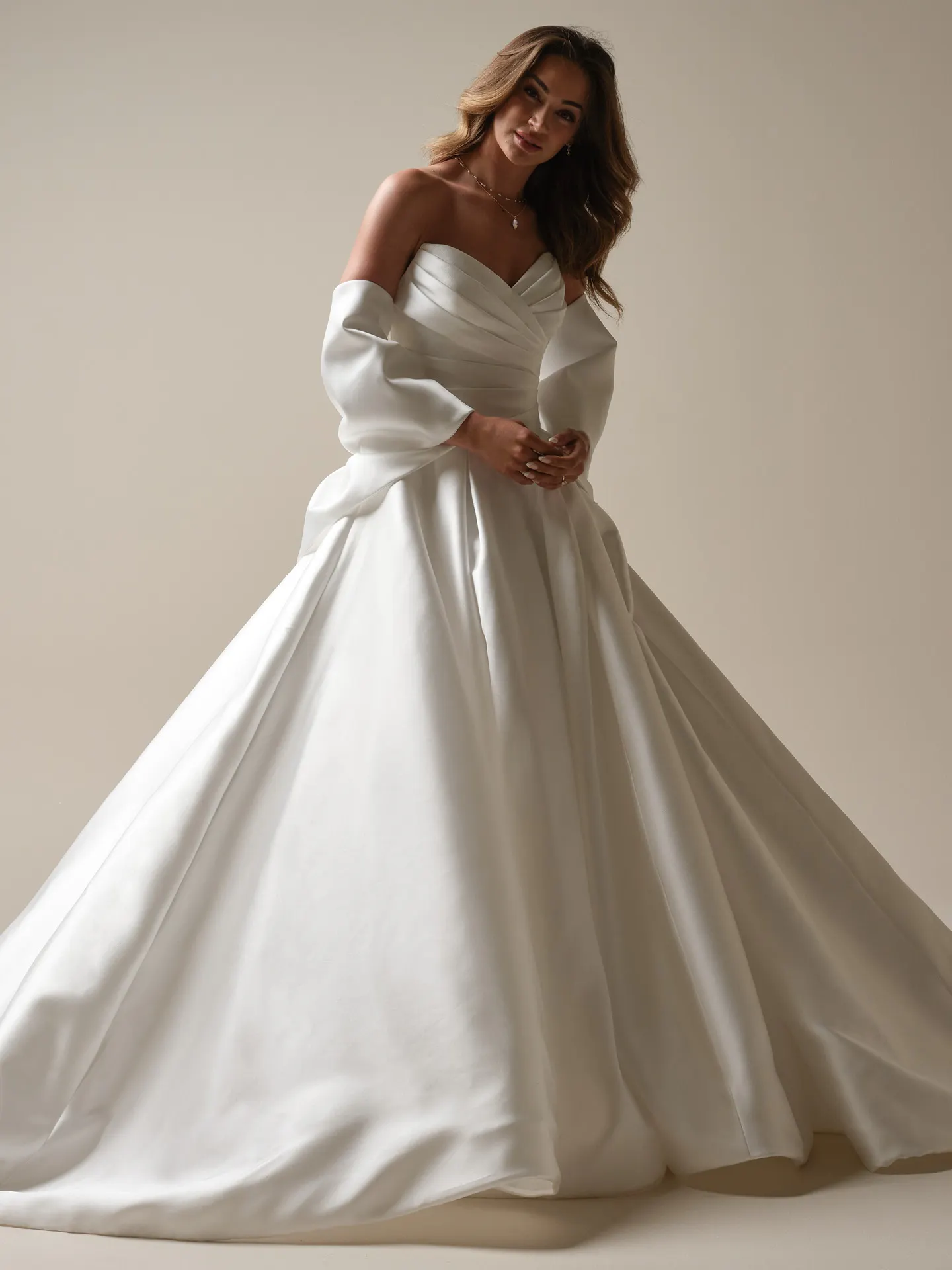 Maggie Sottero Aubrielle front view in Reena Mikado with detachable wedding bow