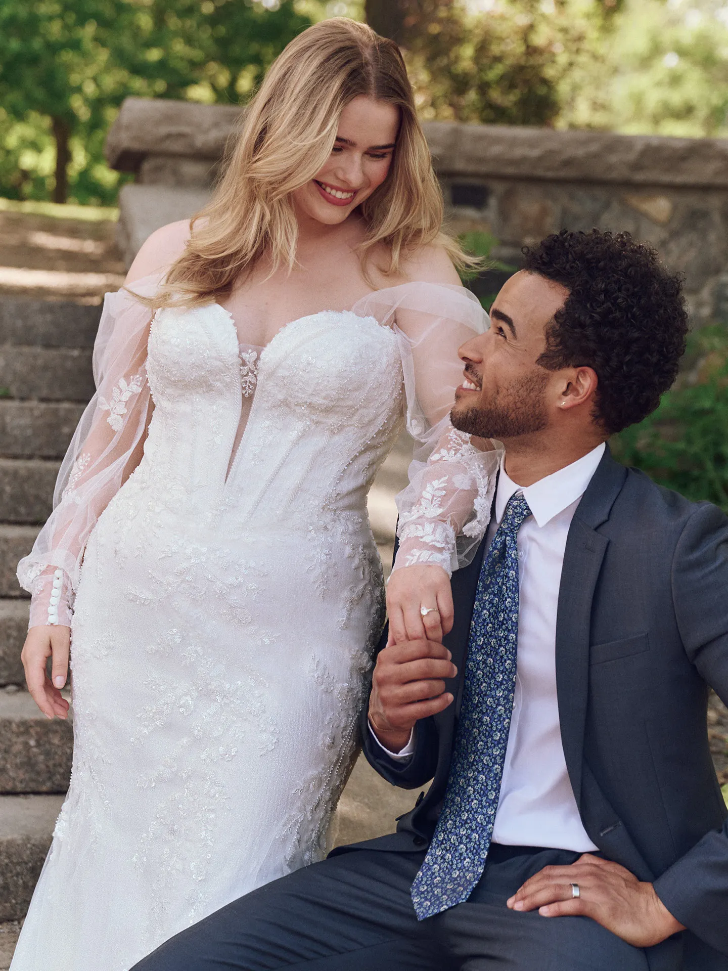 Maggie Sottero Benjie front view lace mermaid bridal dress with sequin details in garden setting