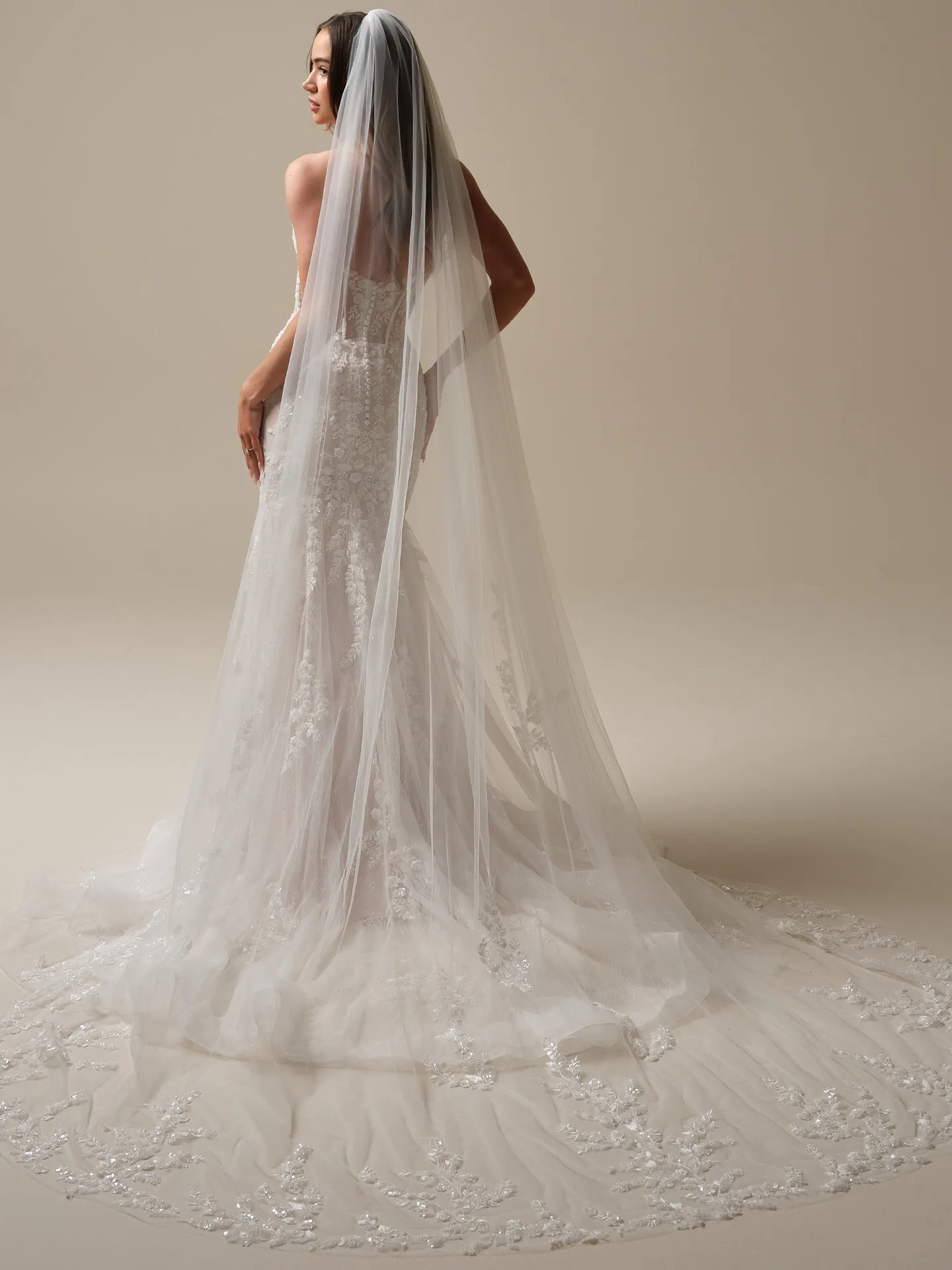 Maggie Sottero chapel length veil with sequin lace motifs, back view